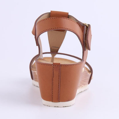 Fashionable sandal with metal and Velcro closure