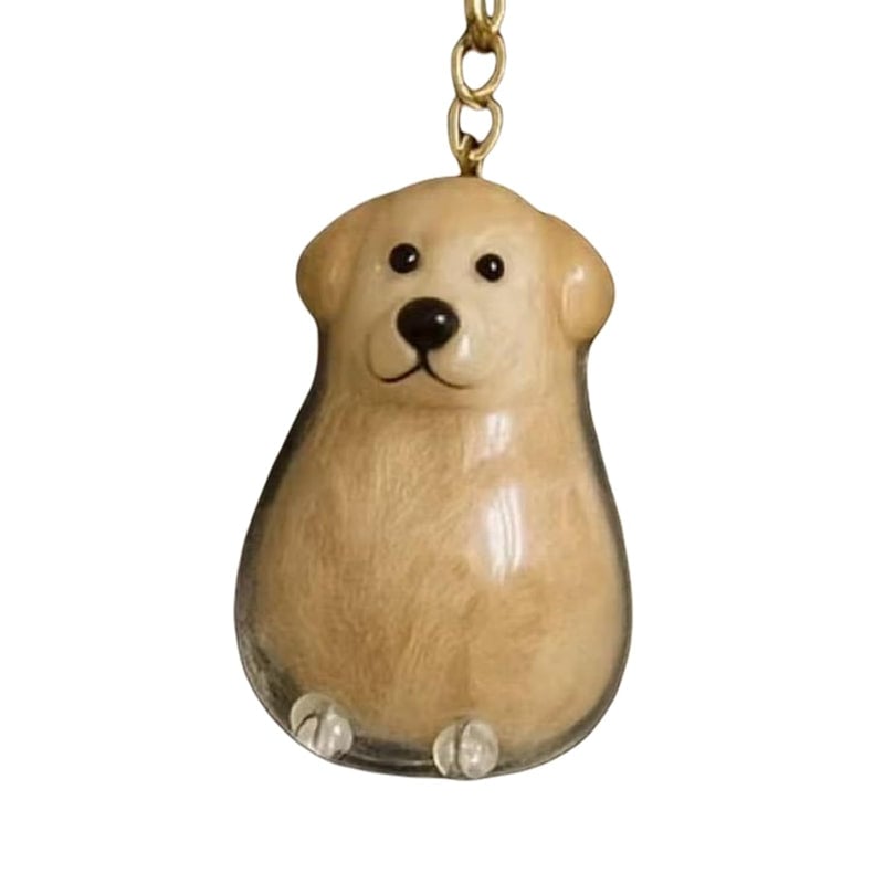 A cute puppy-shaped fur storage keychain
